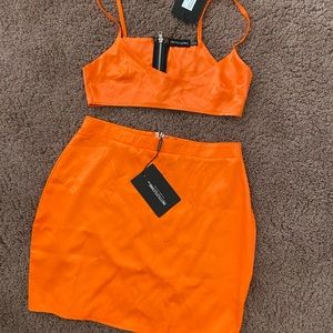 Neon orange mini skirt and crop top set